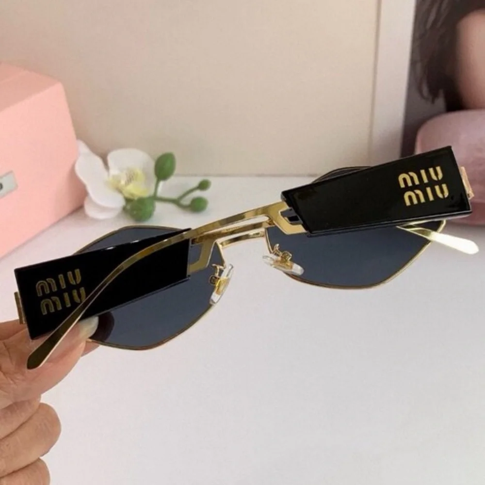 Miu Miu Gold Frame Black Lens Geometric Sunglasses